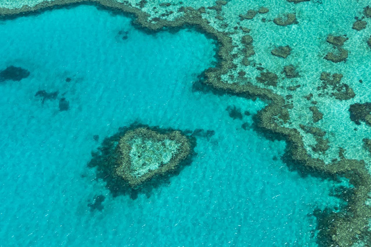 gallery-01 Stunning aerial shot of the heart-shaped coral formation in the Great Barrier Reef, Australia.